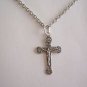 Silver Plated Rounded Edge with Lilies Crucifix on a 24" Stainless Steel Necklace