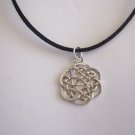 Beautiful Shiny Celtic Knot Circle on a 18" Black Suede Choker or Necklace