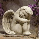 Stone-Finished Sitting Angel