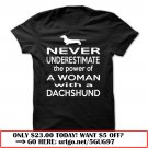 never underestimate the power a of a woman with a dachshund