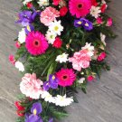 Bright and blooming funeral swag