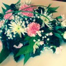 Long and low pink and white table arrangement