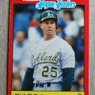 1989 FLEER BASEBALL "League Leaders" - Mark McGwire (#27)