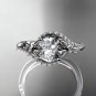 Platinum diamond leaf and vine engagement ring with a Moissanite center stone ADLR112