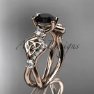 14kt rose   gold celtic trinity knot engagement ring with a Black Diamond center stone CT768