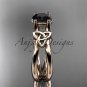 14kt rose gold celtic trinity knot engagement ring with a Black Diamond center stone CT7130