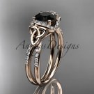 14kt rose gold diamond celtic trinity knot engagement ring with a Black Diamond center stone CT7155
