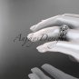 14kt white gold diamond celtic trinity knot wedding ring with a Moissanite center stone CT7131S