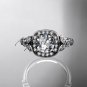 14kt white gold diamond engagement ring with a Forever One Moissanite  center stone ADLR179