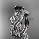 14kt white gold celtic trinity knot engagement set with a Black Diamond center stone CT768S