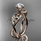 14kt rose gold diamond celtic trinity knot engagement ring with a Moissanite center stone CT7221