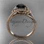 14kt rose gold celtic trinity knot engagement ring with a Black Diamond center stone CT7322