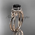14kt rose gold diamond celtic trinity knot wedding ring with a Black Diamond center stone CT7373