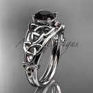 14kt white gold celtic trinity knot engagement ring with a Black Diamond center stone CT765