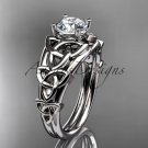 Platinum  celtic trinity knot engagement ring with a Moissanite center stone CT765