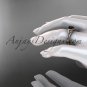 14kt rose gold celtic trinity knot engagement ring with a Black Diamond center stone CT7108