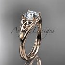 14kt rose gold celtic trinity knot engagement ring with a Moissanite center stone CT7189