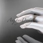 14kt rose gold celtic trinity knot engagement ring with a Black Diamond center stone CT7189