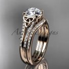 14kt rose gold celtic trinity knot engagement ring  with a Moissanite center stone CT7108S