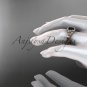 14kt rose gold diamond celtic trinity knot engagement ring with a Black Diamond center stone CT7302
