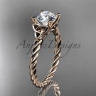 14kt rose gold rope triquetra celtic engagement ring with a Moissanite center stone RPCT9116