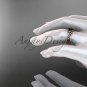 14kt rose gold rope triquetra celtic engagement ring with a Black Diamond center stone RPCT9112