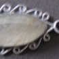 Copper & Silver necklace with Rutilated Quartz wrapped in Silver spirals.