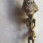 Brass Piper Earring