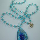 Turquoise Lampwork Pendant on Turquoise Crystal and Bead Necklace