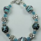 handcrafted Turquoise and Black Floral Lampwork Bracelet
