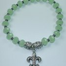handcrafted Green Crystal Stretch Bracelet with Silver Plated Fleur de Lis