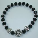 handcrafted Black Crystal Stretch Bracelet with Silver Plated Flowers