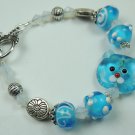 Turquoise Cat Lampwork Bracelet with Turquoise Swirl and Dot Lampwork
