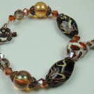 Black Brown Beige Swirl Lampwork Bracelet with White & Red Spotted Porcelain Giraffe