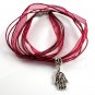 Silver Hansa Hand Charm on a Dark Red Ribbon Necklace