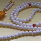 sea shell chanting beads. string of 108