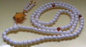 sea shell chanting beads. string of 108