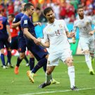 311 - 8 X 6 Photo - Football - FIFA World Cup 2014 - Spain V Holland - Xabi Alonso Celebration