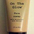 TanTowel  On the Glow 2 oz Face Tinted Daily Moisturizer with Retinol Tan Towel