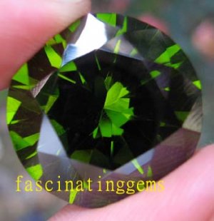 208.00CT STUNNING DEEP GREEN ROUND ZIRCON