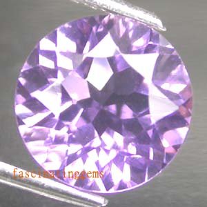 21.65CT BEAUTIFUL GLISTENING ROUND PURPLE ZIRCON