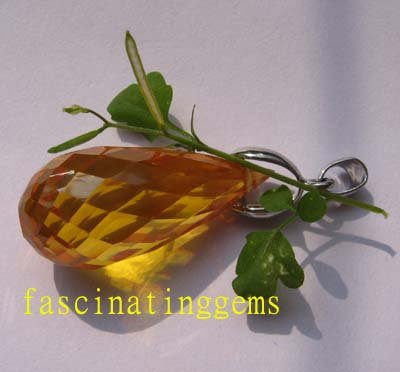 IF~50.15CT BRILLIANT FUNNELED YELLOW ZIRCON PEADANT