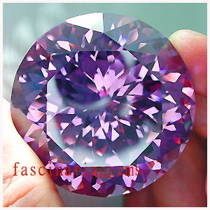 48.05CT BEAUTIFUL GLISTENING ROUND PURPLE ZIRCON
