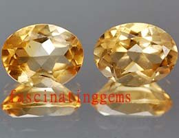 10.05CT PAIR STUNNING YELLOW OVAL ZIRCON