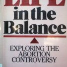 Life in the Balance Exploring the Abortion by  Robert N. Wennberg