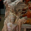 Asian Wooden Standing Buddha with Wooden Background