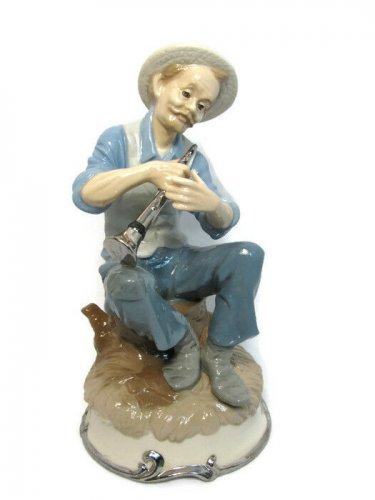 Narco Man Playing Horn Sitting on A Rock Figurine Statue Blue