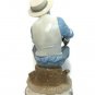 Narco Man Playing Horn Sitting on A Rock Figurine Statue Blue