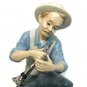 Narco Man Playing Horn Sitting on A Rock Figurine Statue Blue