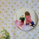 Round hand mirror (flower girl back)